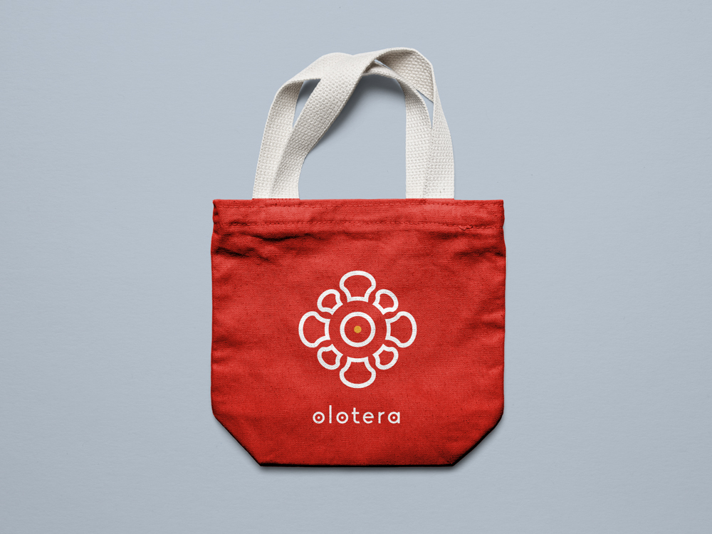 Olotera's visual identity available on totebag